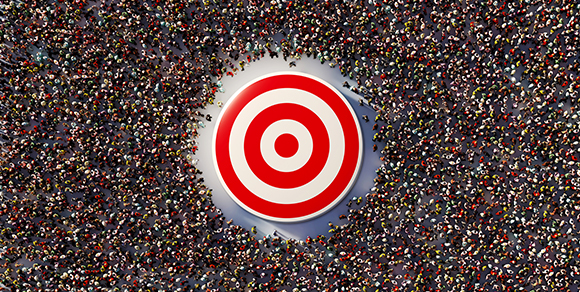 An aerial view of a large target surrounded by a crowd of people