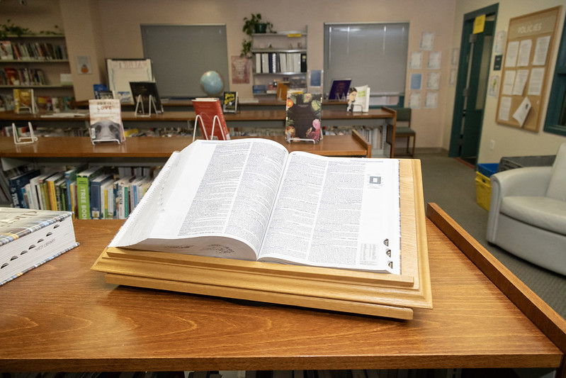 54623166115_01b8fe9fb5_c A dictionary open and on display in a prison library.